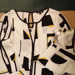 Women long sleeve Blouse, black & yellow patterns.